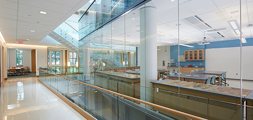 Glass-walled labs in STEM Hall, promoting the concept of "science in sight".