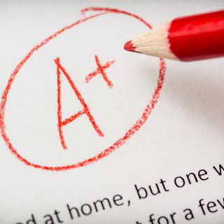 What is a Teacher’s Assistant? Grading term paper or school essay a plus